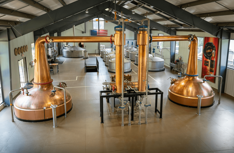 Polished copper distillery stills